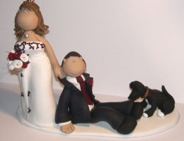 bride-dragging-groom-cake-topper