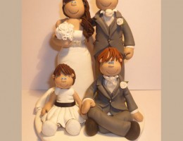 bride-groom-2-childen-sitting-cake-topper