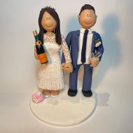 bride-groom-drinking-champagne-wedding-topper