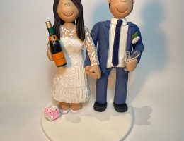 bride-groom-drinking-champagne-wedding-topper