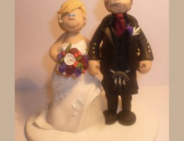 bride-groom-hand-on-bum-cake-topper