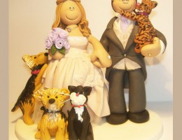 bride-groom-holding-cat-cake-topper