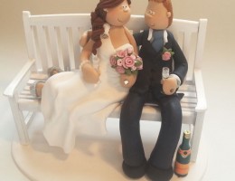 bride-groom-on-bench-cake-topper