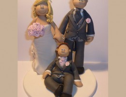 bride-groom-son-sitting-down-cake-topper