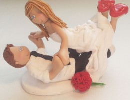 bride-groom-superman-pose-cake-topper