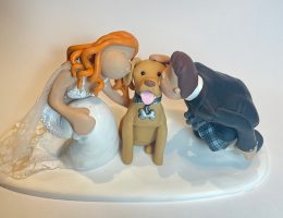couple-kissing-pet-dog-cake-topper