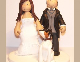 dog-looking-at-bride-groom-cake-topper