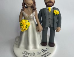 grey-suit-yellow-flowers-cake-topper