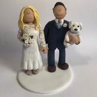 groom-carrying-pet-dog-cake-topper