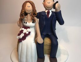 groom-on-phone-wedding-cake-topper