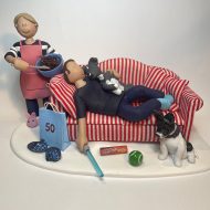 relaxed-couple-on-sofa-cake-topper