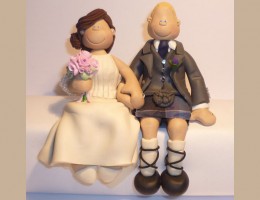 scottish-groom-sitting-cake-topper