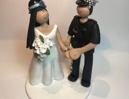 under-arrest-wedding-cake-topper